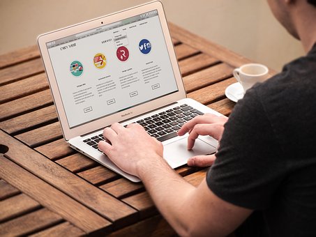 typing on laptop
